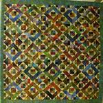 Pieced Quilt Professional
Third Place
Fat Quarter Award - Peoples Bank
Entered by:	Darlene Collins
	Dimmitt,  TX
Made by:	Darlene Collins
Quilted by: 	Darlene Collins
Pattern by:  Ogallala Triangles
Size: 	92 x 92
Fifty Years & Still Together