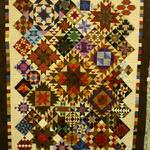 Pieced Two Person Quilt
Third Place
Entered by:	Laura Hyatt
	Cerrillos,  NM
Made by:	Laura Hyatt
Quilted by: 	Sue Wyard
Pattern by:  Lori Smith
Size: 	62 x 78
Patchwork Sampler
