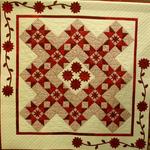 Mixed Technique Two Person/Group Quilt
First Place
Fat Quarter Award - Olde Hotel
Bed & Breakfast
Entered by:	Cynthia Shattles
	Perryton,  TX
Made by:	Cynthia Shattles
Quilted by: 	Vicki Kunka
Pattern by:  Janet Jones Worley
Size: 	58.5 x 58.5
White Chocolate & Cherries
