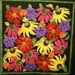 Wall Quilt Two Person/Group
First Place
Fat Quarter Award - Chapparal Chaparral Quilters Guild
Entered by:	Brownie Kendrick
	Amarillo,  TX
Made by:	Brownie Kendrick
Quilted by: 	Shannon Kratochvil
Pattern by:  Carol Morrisey
Size: 	48 x 48
Summer Flowers
