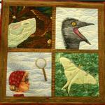 Theme Quilt
First Place 
Entered by:	Ina Cleavinger
	Dimmitt, TX
Made by:	Ina Cleavinger
Quilted by: 	Ina Cleavinger
Size: 	28 x 28
Critters Under The Magnifying Glass
