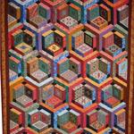 Pieced Quilt Amateur
Fat Quarter Award -  California
Quilting Friends
Entered by:	Lorie Mitteer
	Roswell, NM
Made by:	Lorie Mitteer
Quilted by: 	Lorie Mitteer
Pattern by:  	Jinny Beyer
Size: 	70 x 76
Eye Play
