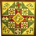 Pieced Two Person Quilt
Honorable Mention 
Entered by:	Jo Ann Steinhauser
	Lubbock, TX
Made by:	JoAnn Steinhauser
Quilted by: 	Beth Bender
Pattern by:  	Scrapbag Ladies Quilting Group
Size: 	66 x 67
Memory Quilt
