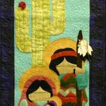Wall Quilt Amateur
Second Place 
Entered by:	Alexis Swoboda
	Roswell, NM
Made by:	Alexis Swoboda
Quilted by: 	Alexis Swoboda
Pattern by: 	Donna Sylvia
Size: 	16 x 31
Holy Night
