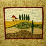 Wall Quilt Amateur
Honorable Mention 
Entered by:	Michelle Quinto
	Amarillo, TX
Made by:	Michelle Quinto
Quilted by: 	Michelle Quinto
Pattern by:  Karen Eckmeier
Size: 	23 x 20
Tuscan Landscape