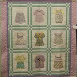 Appliqué Quilt Amateur	
First Place
Cotton Boll Award for Best Hand Quilting
Entered by:	Zona Clark
	Lubbock, TX
Made by:	Zona Clark
Quilted by: 	Zona Clark
Pattern by:  	Acorn Quilt & Gift Company
Pattern Name:Betsy's Closet
Size: 	50  x 56
Victoria's Closet