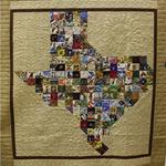 Pieced Two Person Quilt Large
Fat Quarter Award - Main Street Market
Entered by:	Sylvia Hale
	Stanton, TX
Made by:	Sylvia Hale
Quilted by: 	Doris Rice
Pattern by:  	Peggy & Pat  -
	 2 S.A. Broads
Pattern Name: Texas Two Step
Size: 	76.25  x 85
Texas Two Step