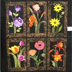 Wall Quilt Professional   
Honorable Mention
Entered by:	Laura Hyatt
	Cerrilles, NM
Made by:	Laura Hyatt
Quilted by: 	Laura Hyatt
Size: 	37  x 41.5
Favorite Things